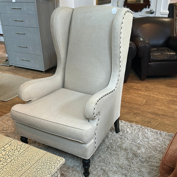 White wing chair studded